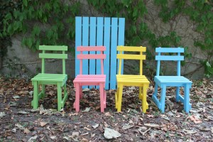 wooden furnitures for children in bright colors. 4 chairs and 1 table